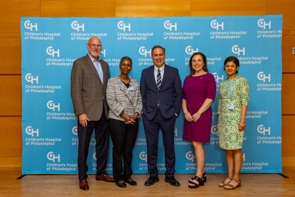 From left: Travis Rhodes, Regional President, Truist; Sophia Holder, CHOP; Matt Bergheiser, President, University City District; Cait Garozzo, Executive Director, The Skills Initiative; and Surabhi Virmani, Children’s Hospital of Philadelphia. UCD President Matt Bergheiser speaks on stage. (Photo by Ben Tran)